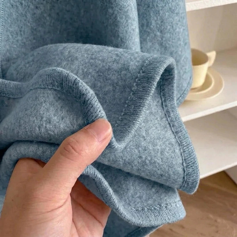 Stugans Poncho i Rökblå