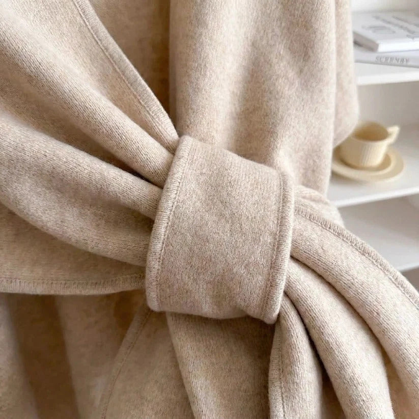 Stugans Poncho i Sand