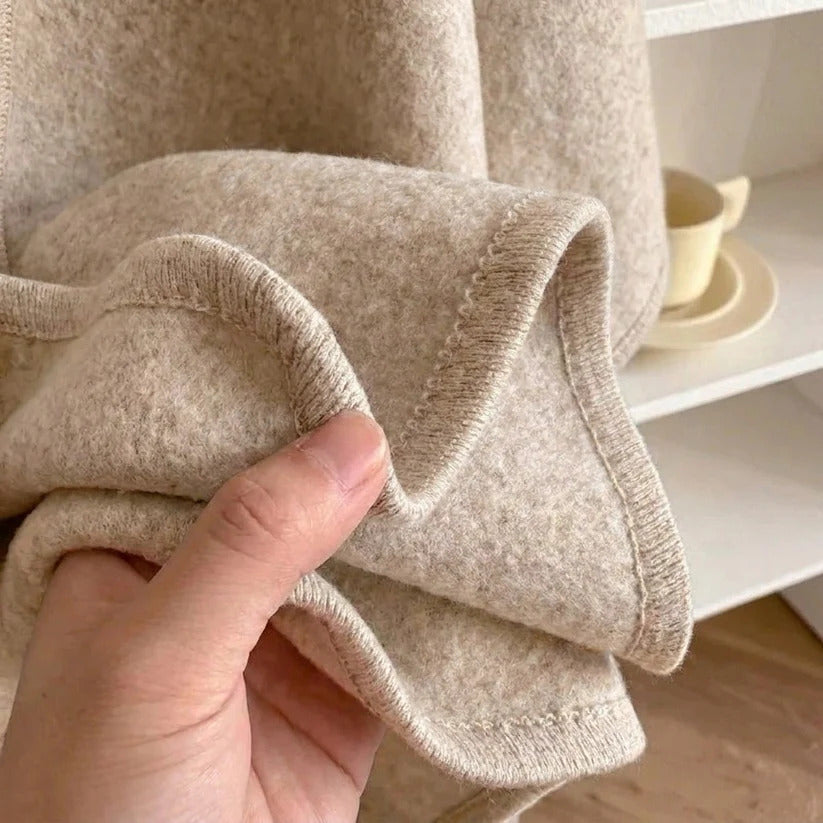 Stugans Poncho i Sand